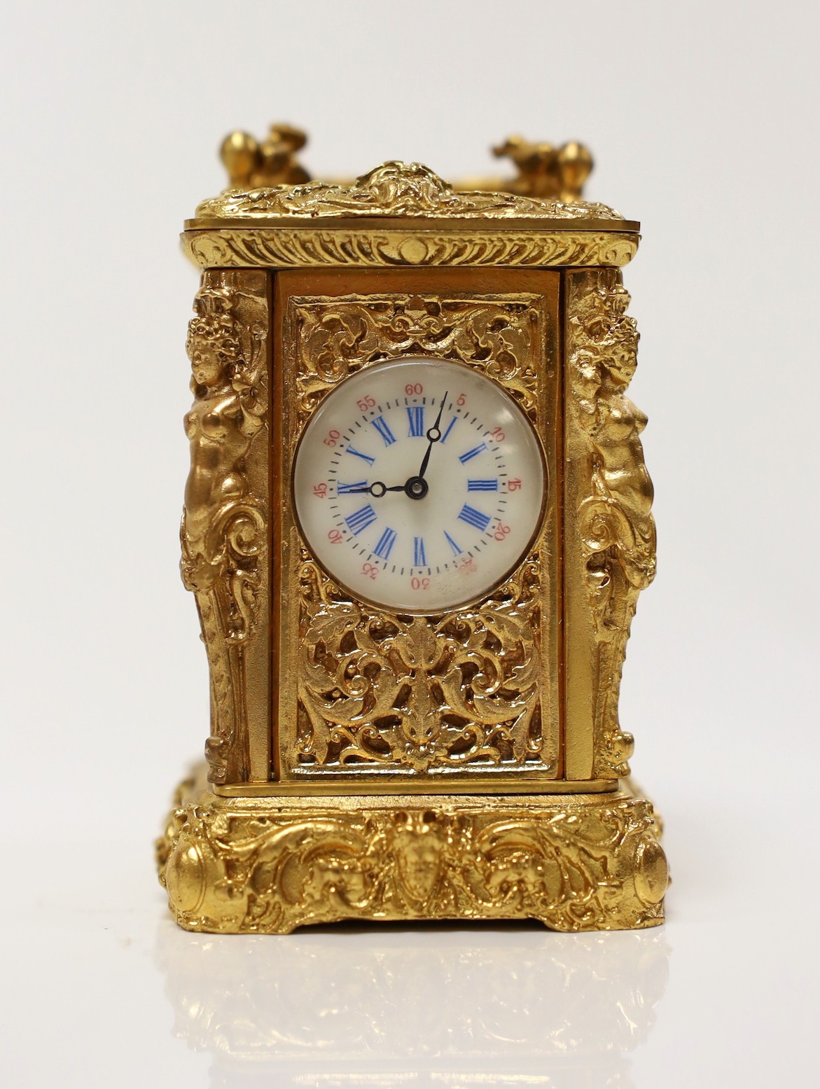 A miniature carriage timepiece, 7cms high